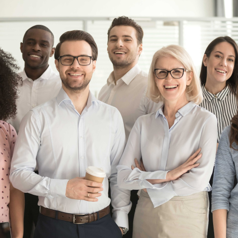 workers taking a group photo at work1